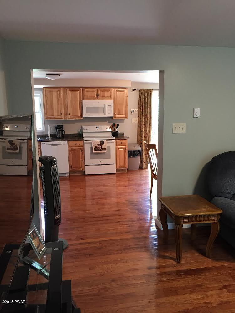 34 Deer Run Road Hawley, PA 18428 - Photo 4 of 16 Kitchen through livingroom
