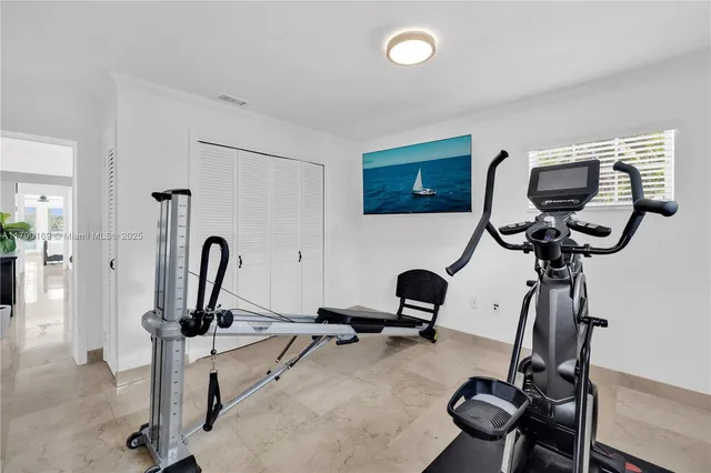 a view of a room with gym equipment