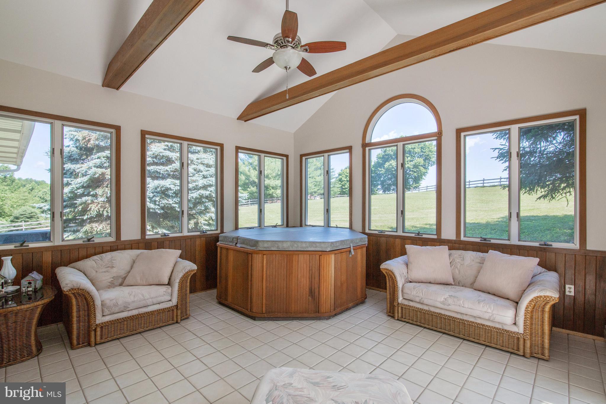 26809 Haines Road Clarksburg, MD 20871 - Photo 12 of 30 Sun Room with Hot Tub