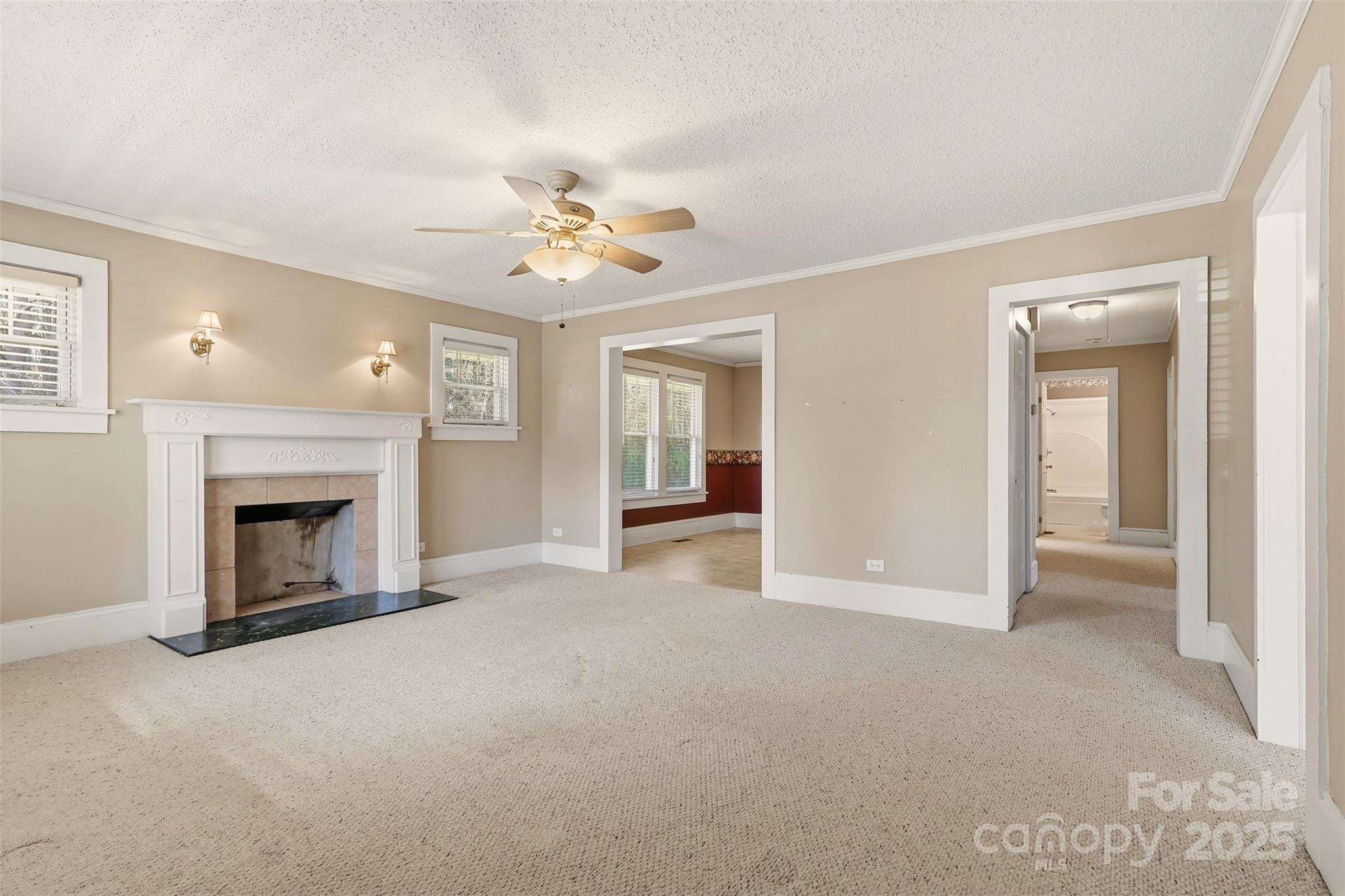 1640 Long Ferry Road Salisbury, NC 28146 - Photo 19 of 47 a view of an empty room with a fireplace