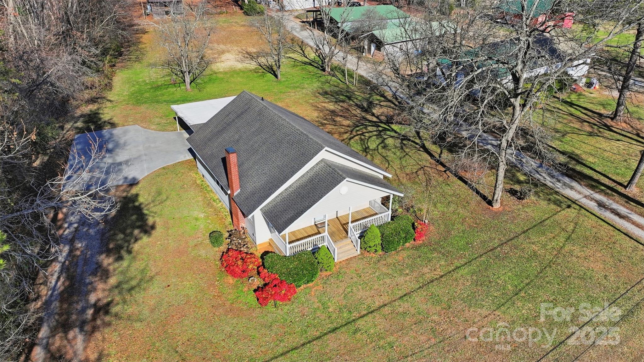 1640 Long Ferry Road Salisbury, NC 28146 - Photo 2 of 47 an aerial view of a house with swimming pool and large trees