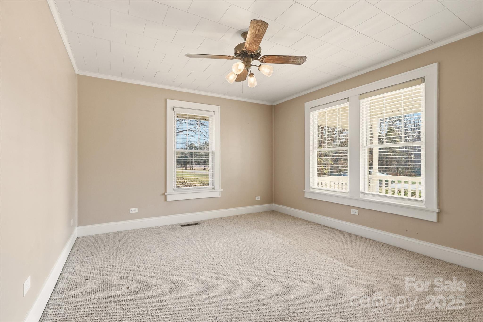 1640 Long Ferry Road Salisbury, NC 28146 - Photo 23 of 47 a view of a livingroom with a ceiling fan and window