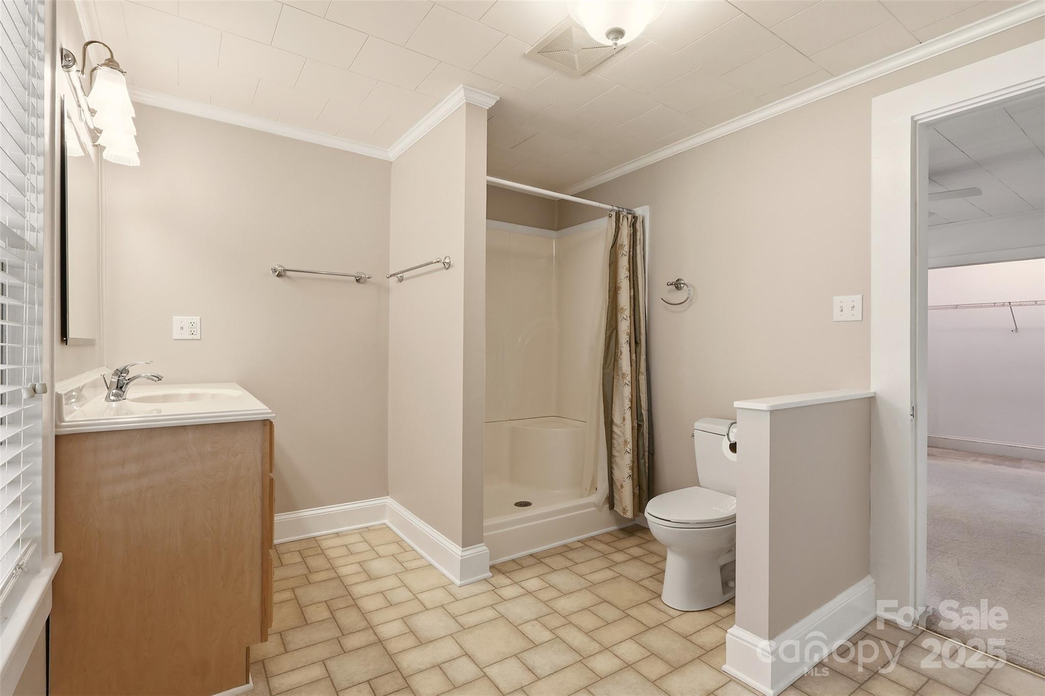 1640 Long Ferry Road Salisbury, NC 28146 - Photo 26 of 47 a bathroom with a granite countertop sink toilet and shower