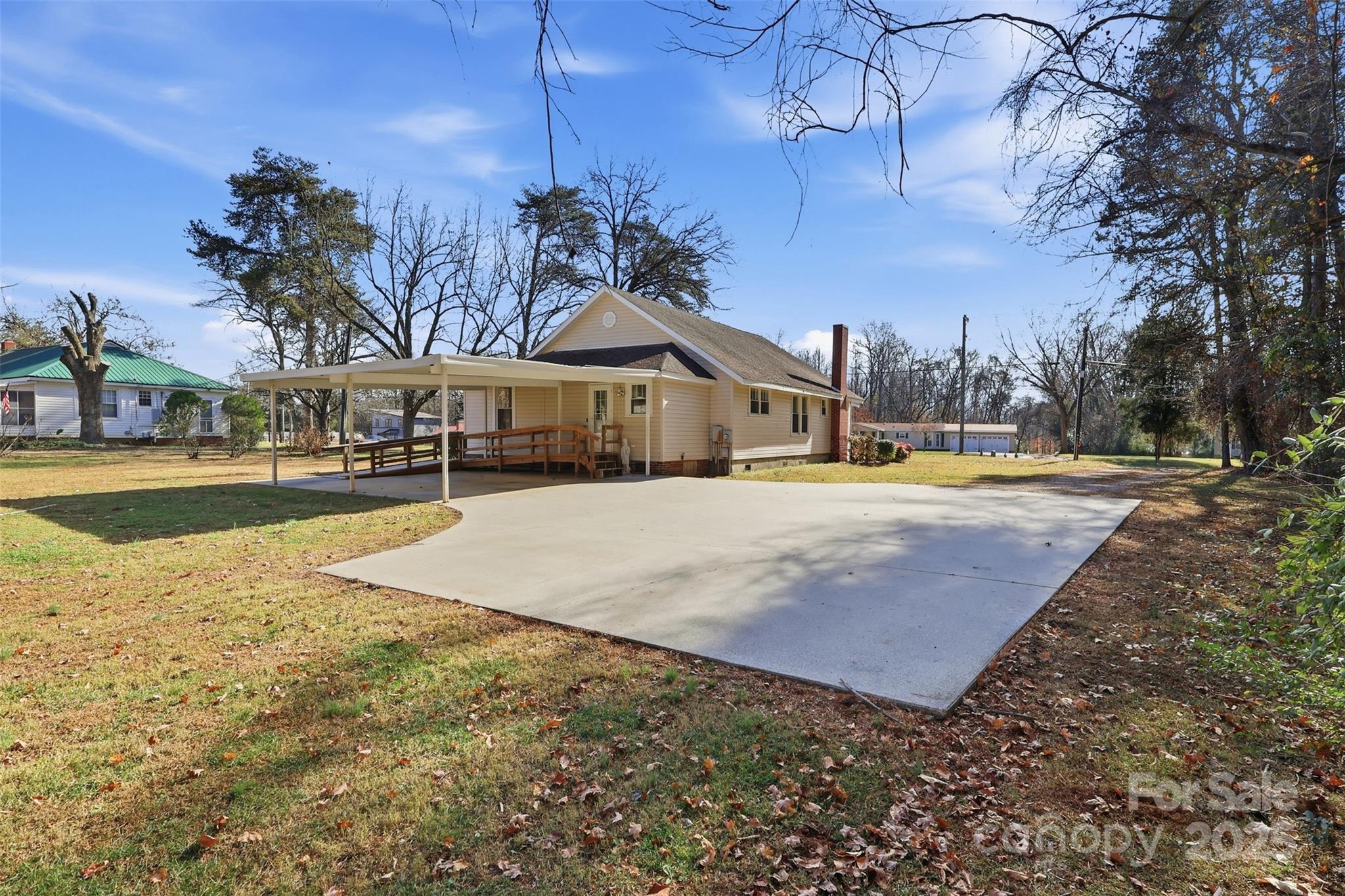 1640 Long Ferry Road Salisbury, NC 28146 - Photo 30 of 47 a view of large house with palm trees