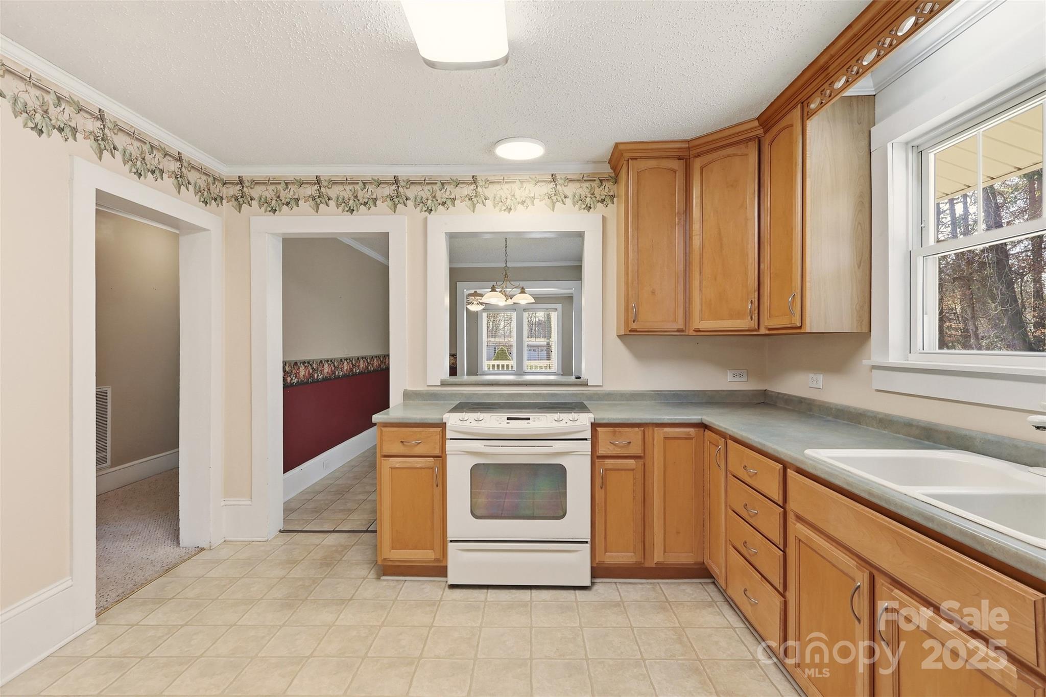 1640 Long Ferry Road Salisbury, NC 28146 - Photo 4 of 47 a kitchen with stainless steel appliances granite countertop a stove and a sink