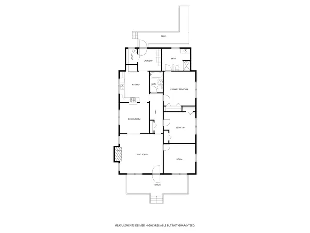 an empty room with chandelier fan and windows