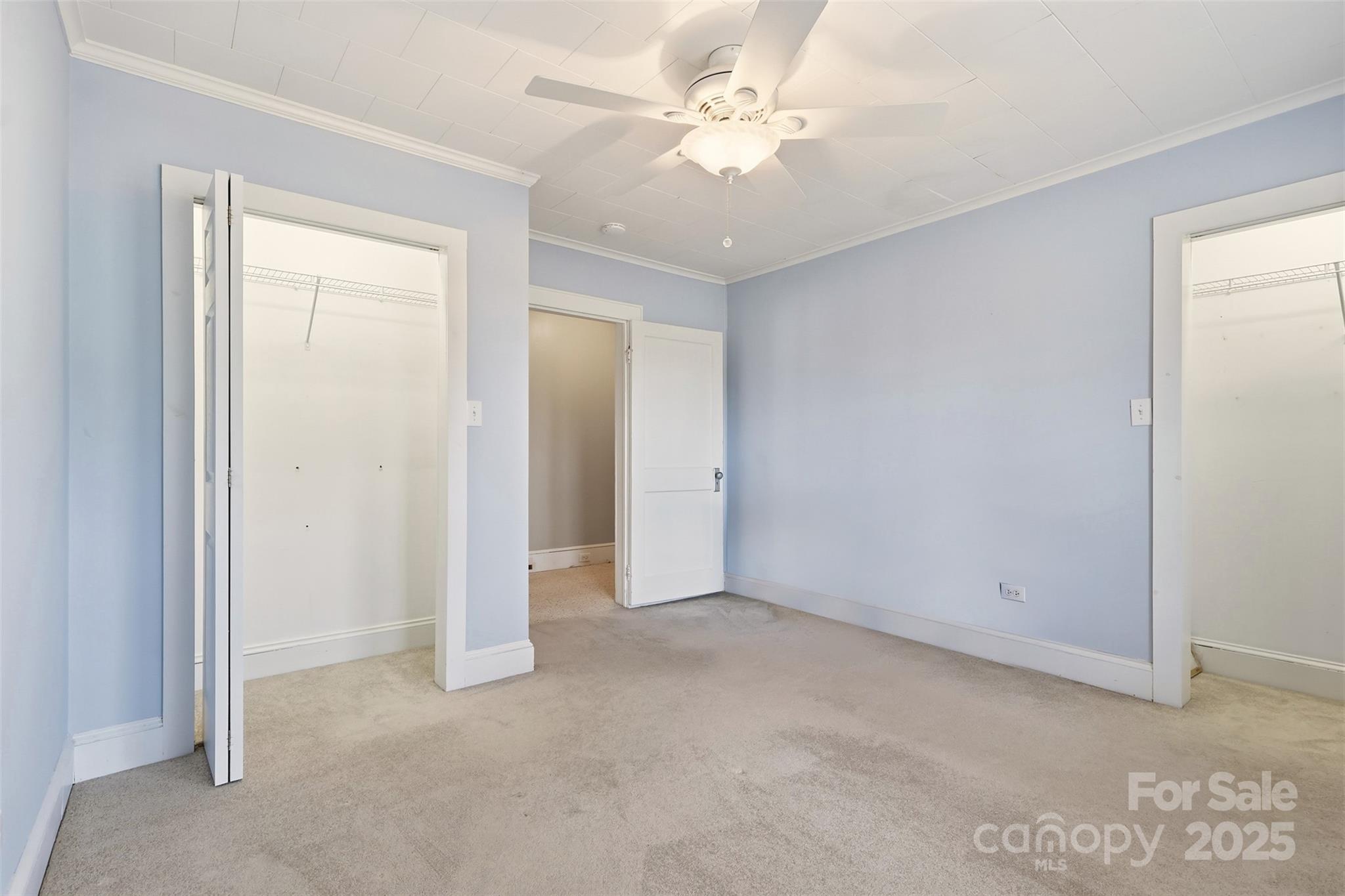 1640 Long Ferry Road Salisbury, NC 28146 - Photo 10 of 47 an empty room with a ceiling fan and a window