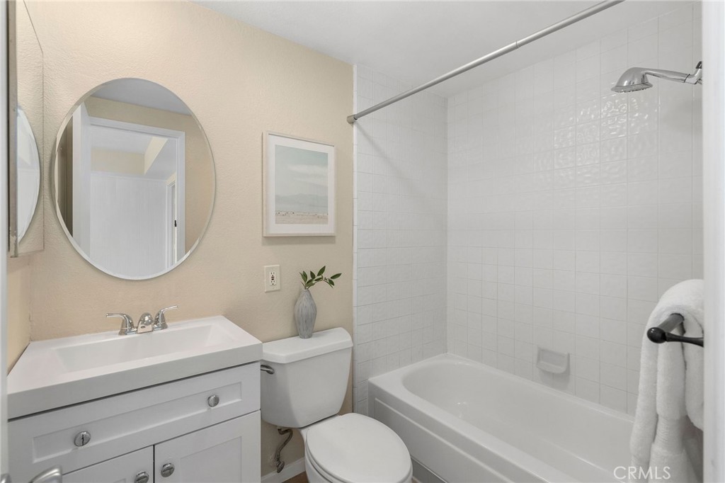 19 B Surfside Surfside, CA 90743 - Photo 13 of 35 a bathroom with a sink toilet and bathtub