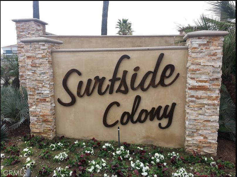 19 B Surfside Surfside, CA 90743 - Photo 30 of 35 a sign board with brick wall
