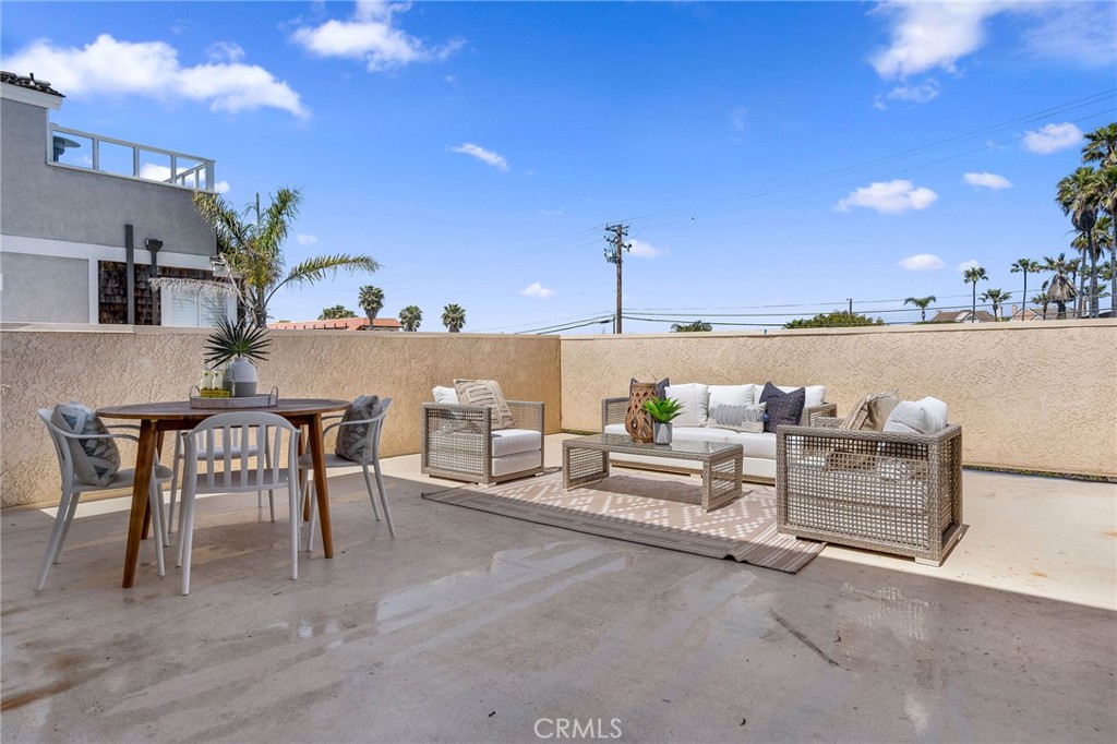 19 B Surfside Surfside, CA 90743 - Photo 9 of 35 a view of a chairs and table in the terrace