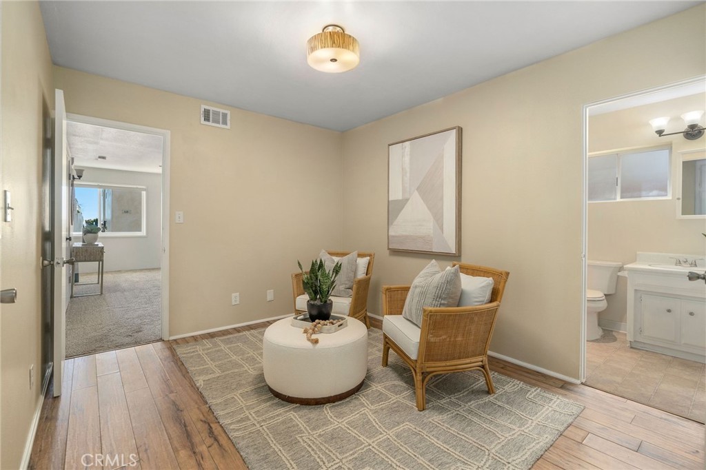 19 B Surfside Surfside, CA 90743 - Photo 10 of 35 a living room with furniture and a table