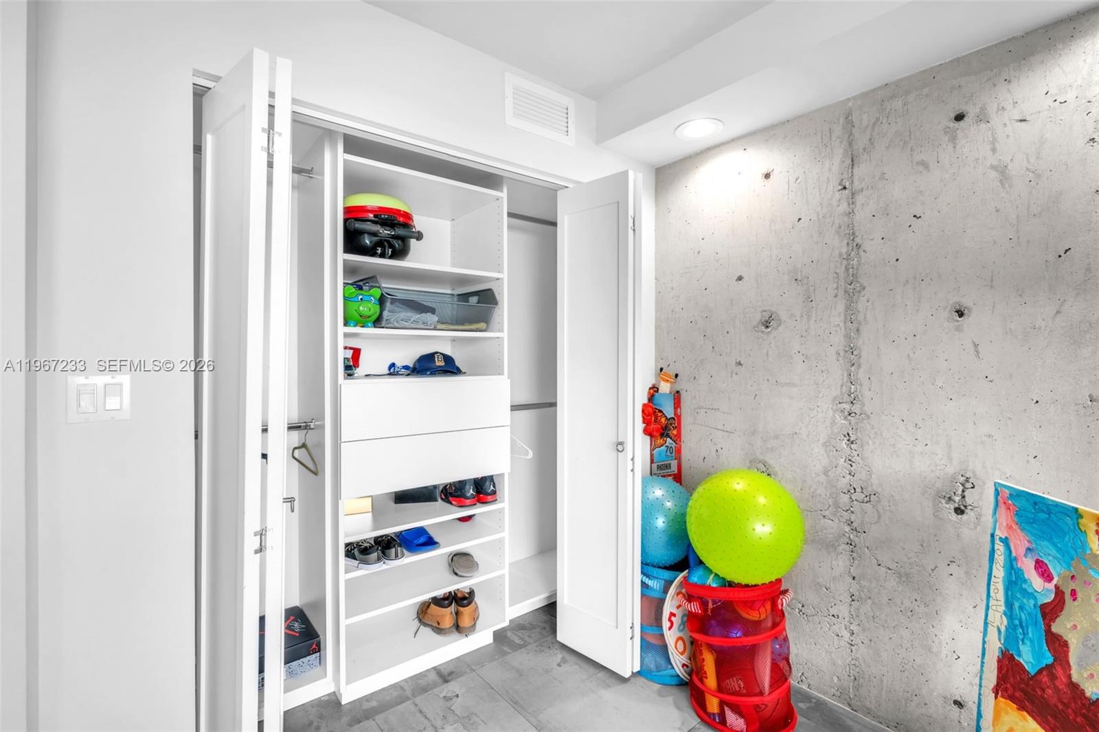 7135 Collins Avenue, Unit 736 Miami Beach, FL 33141 - Photo 13 of 27 a view of play room with toys