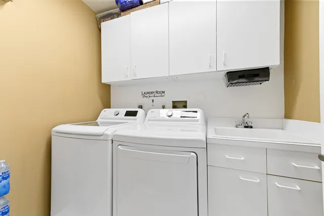 a bathroom with a bathtub and a sink