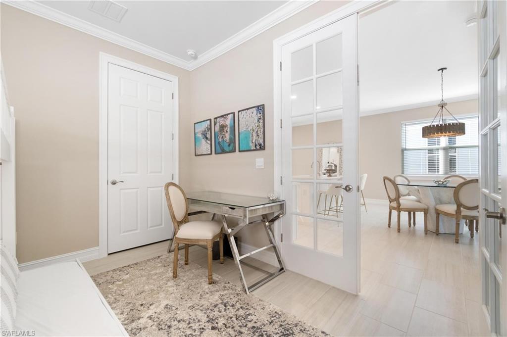 28298 Captiva Shell Loop Bonita Springs, FL 34135 - Photo 26 of 49 a dining room with furniture and window
