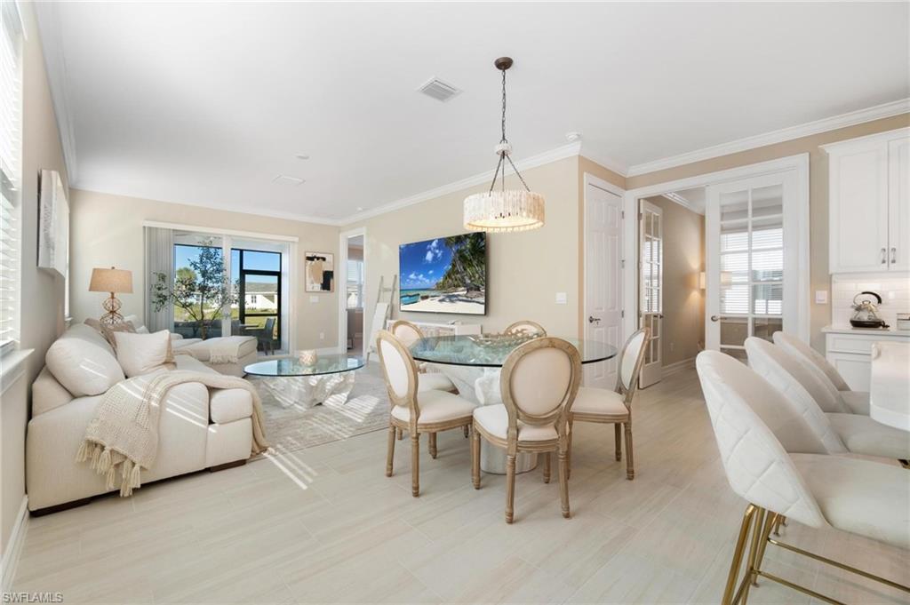 28298 Captiva Shell Loop Bonita Springs, FL 34135 - Photo 27 of 49 a living room with furniture and a table