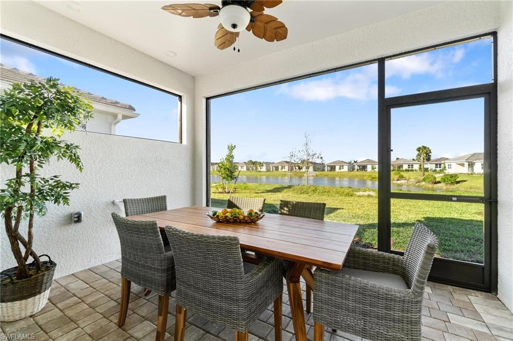 28298 Captiva Shell Loop Bonita Springs, FL 34135 - Photo 43 of 49 a view of a dining room with furniture window and outside view