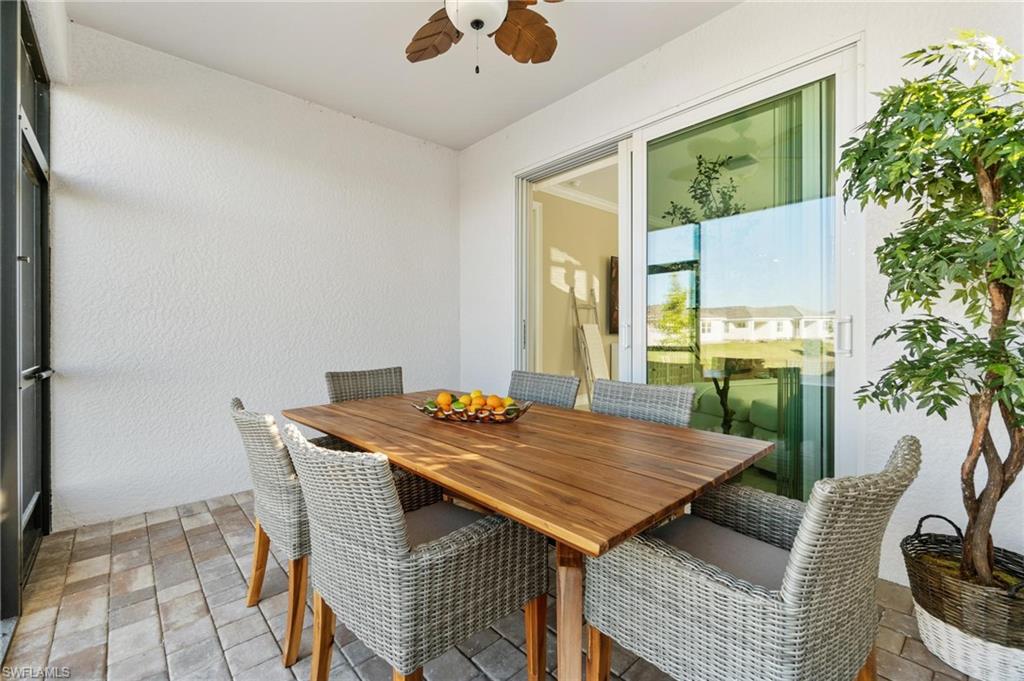 28298 Captiva Shell Loop Bonita Springs, FL 34135 - Photo 46 of 49 a view of a dining room with furniture window and outside view