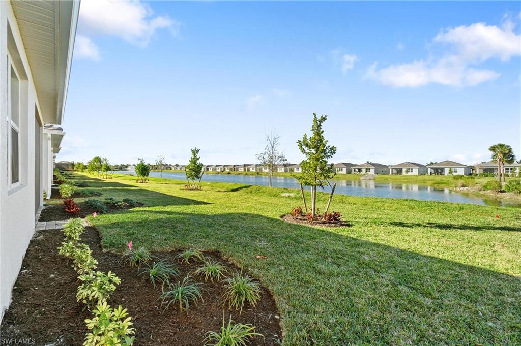 28298 Captiva Shell Loop Bonita Springs, FL 34135 - Photo 49 of 49 a large green field with lots of green space