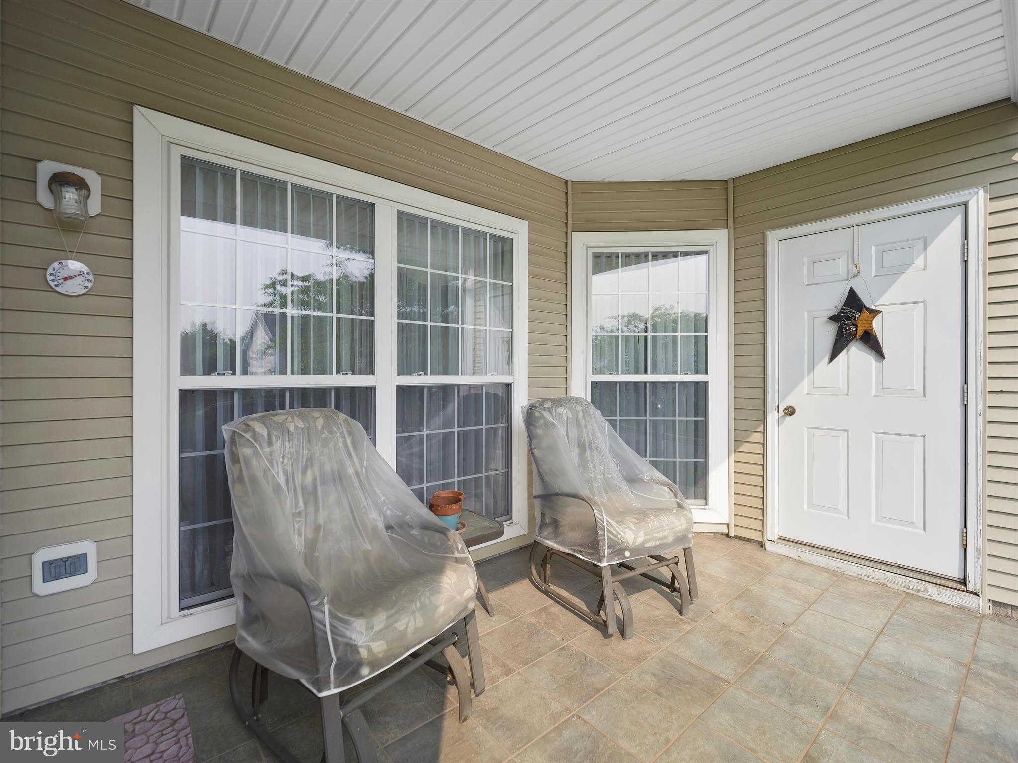 2103 Wayside Drive, Unit 1C Frederick, MD 21702 - Photo 2 of 29 a view of a room with furniture and windows