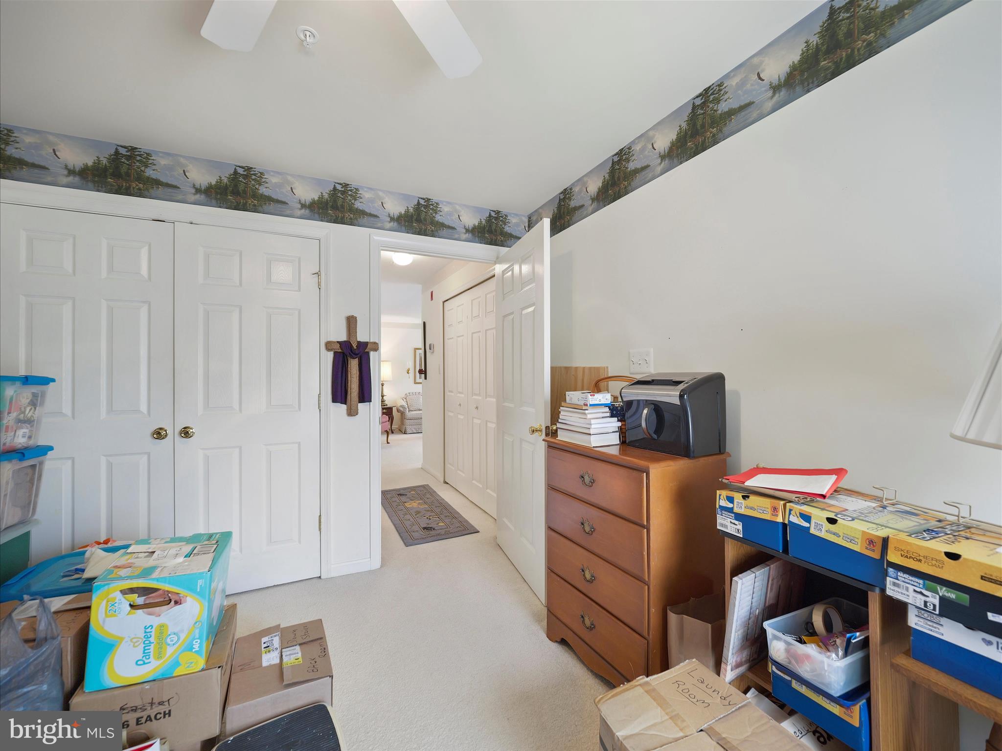 2103 Wayside Drive, Unit 1C Frederick, MD 21702 - Photo 22 of 29 a bedroom with a bed and wooden floor