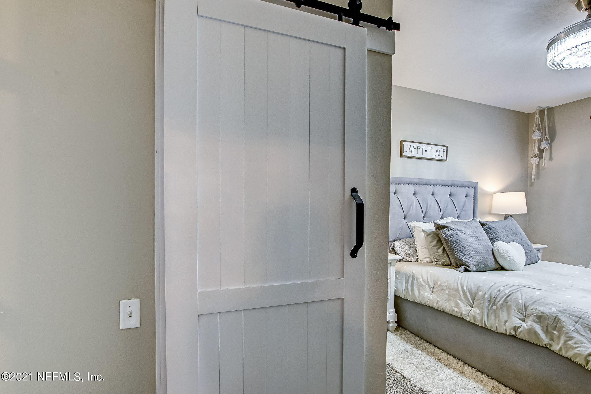 10550 Baymeadows Road, Unit 403 Jacksonville, FL 32256 - Photo 16 of 37 Barn Door to Closet