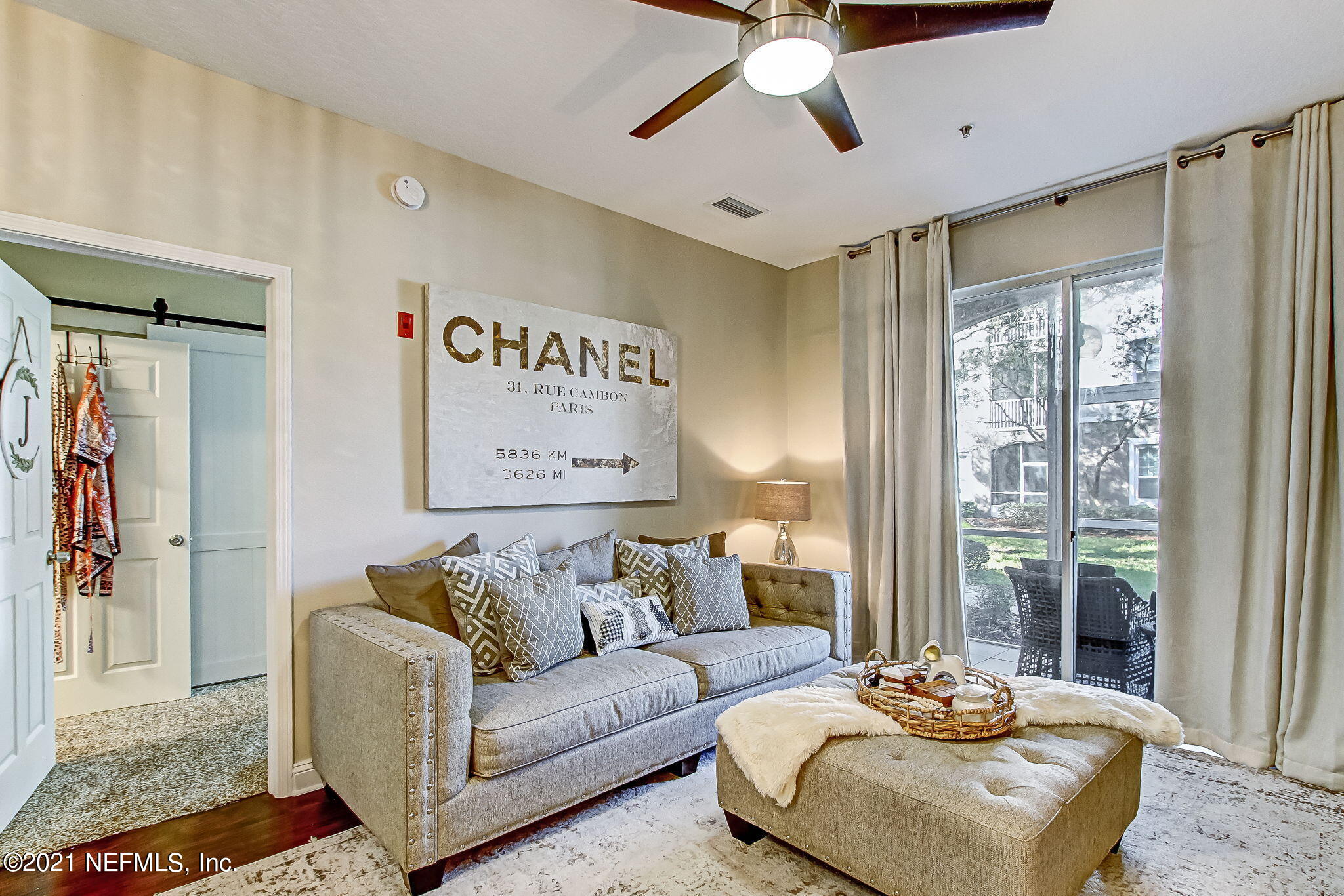 10550 Baymeadows Road, Unit 403 Jacksonville, FL 32256 - Photo 5 of 37 Living opens to screened porch