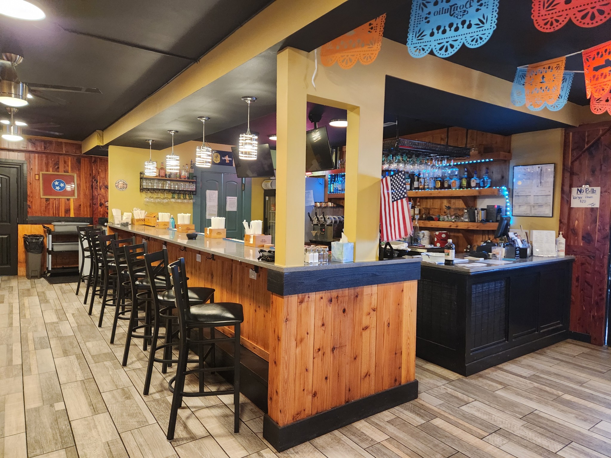 12001 Old Jackson Ridge Road North Rockvale, TN 37153 - Photo 13 of 16 a kitchen with stainless steel appliances kitchen island granite countertop a table chairs and a large window