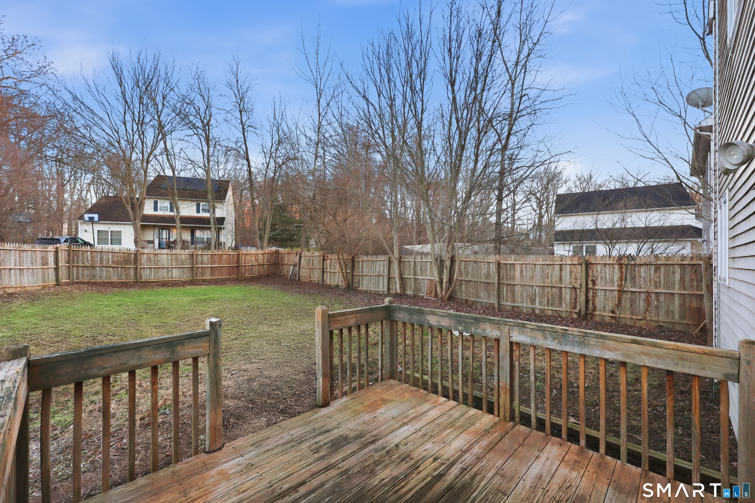 70 Victoria Court Hamden, CT 06514 - Photo 25 of 30 a view of a wooden deck and a yard with swimming pool