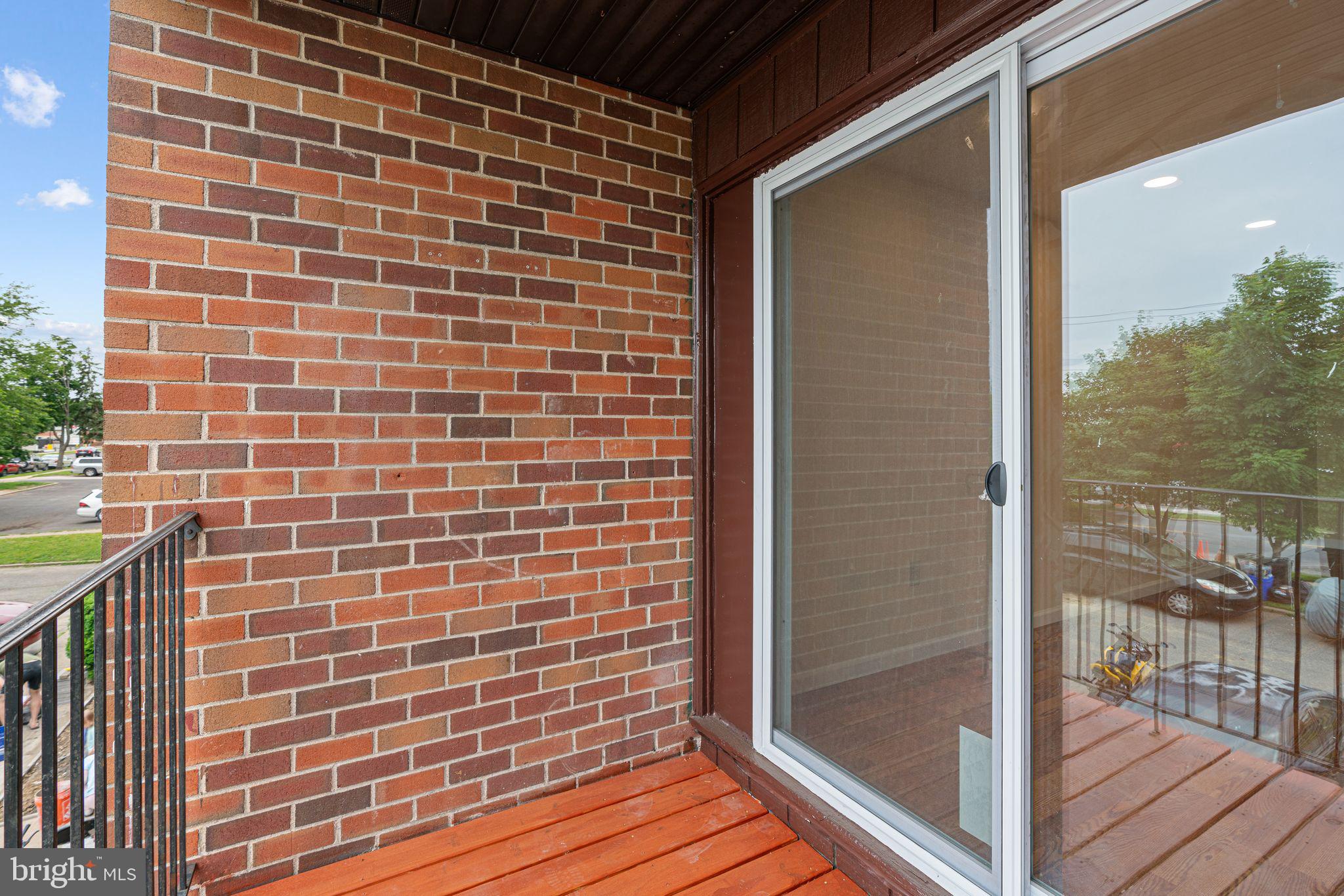3281 Red Lion Road, Unit 2 Philadelphia, PA 19114 - Photo 13 of 15 Charming balcony with brick accents.