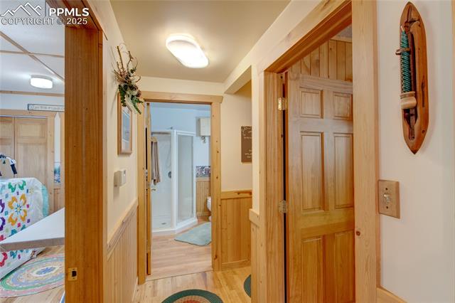 9615 Mountain Road Cascade, CO 80809 - Photo 11 of 31 Hallway to bedroom and bath