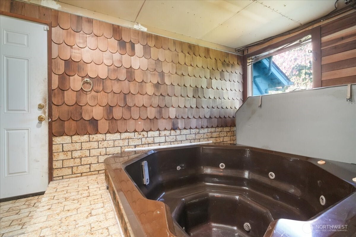 1212 3rd Street Cosmopolis, WA 98537 - Photo 13 of 31 a bathroom with a bathtub and shower