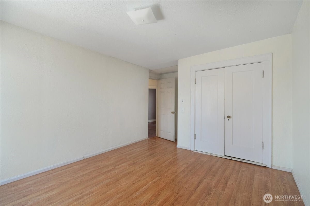 1212 3rd Street Cosmopolis, WA 98537 - Photo 21 of 31 a view of an empty room and wooden floor