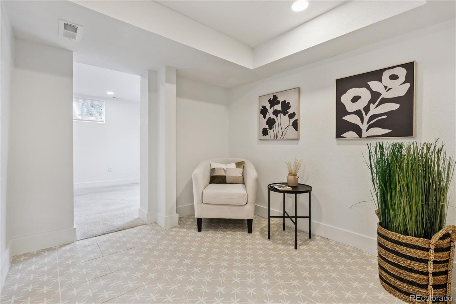 3360 Broadway Boulder, CO 80304 - Photo 12 of 35 a hallway with a bench and couch