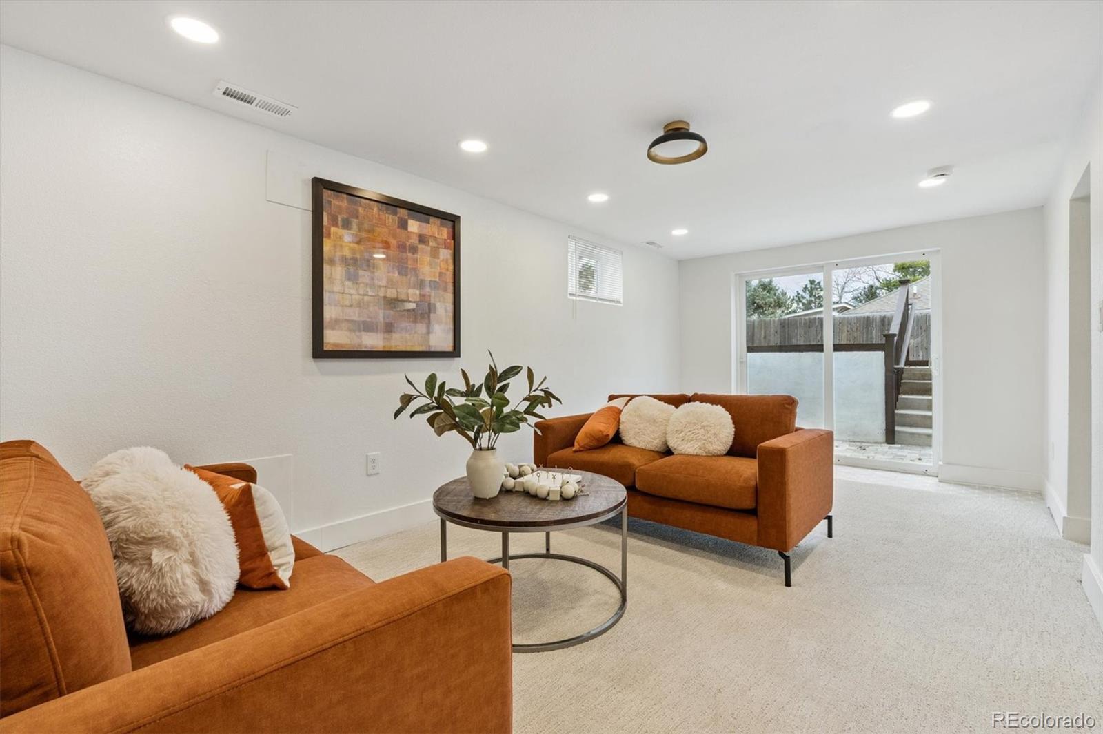3360 Broadway Boulder, CO 80304 - Photo 13 of 35 a living room with furniture and a potted plant