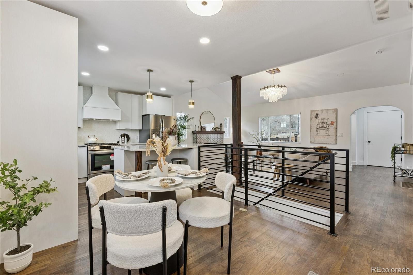 3360 Broadway Boulder, CO 80304 - Photo 2 of 35 a dining room with furniture and wooden floor