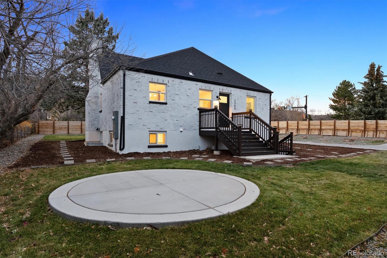 3360 Broadway Boulder, CO 80304 - Photo 21 of 35 a front view of a house with a yard