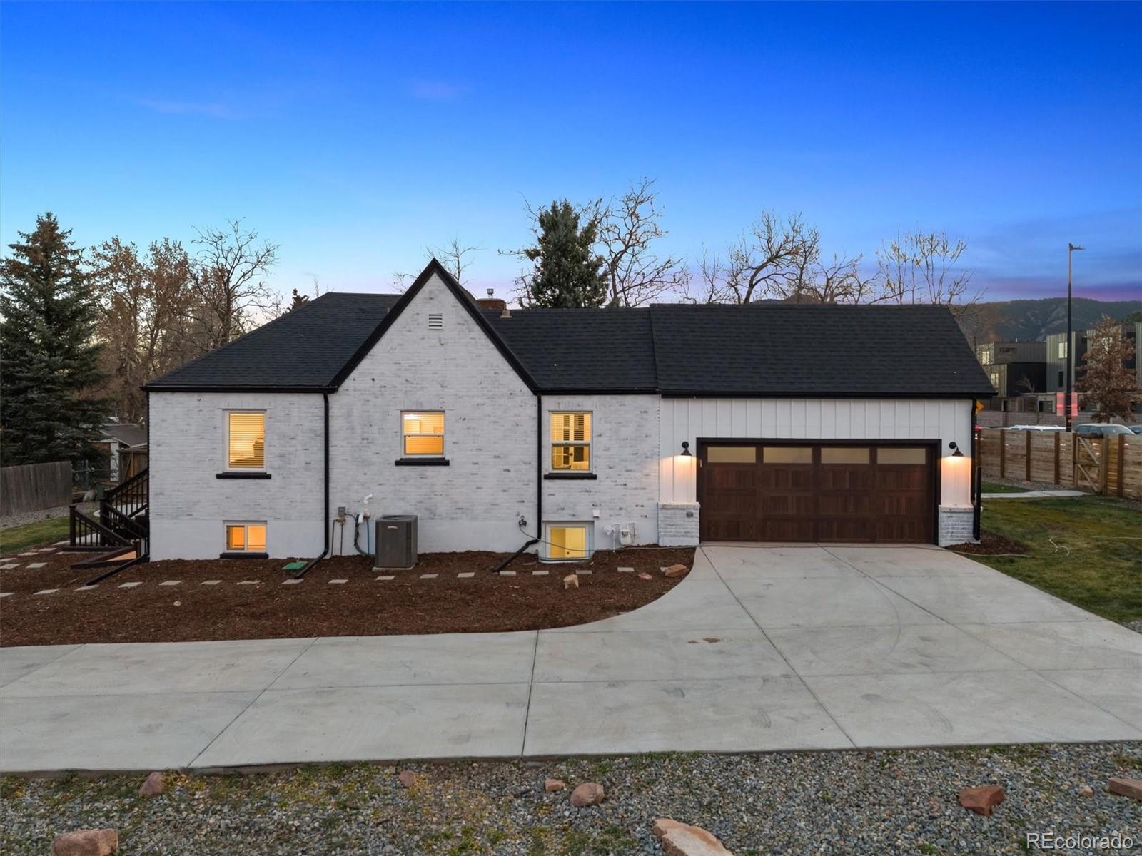 3360 Broadway Boulder, CO 80304 - Photo 32 of 35 a front view of a house with a yard