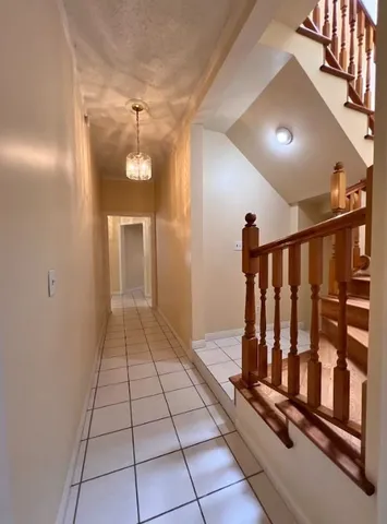 a view of a hallway with entryway