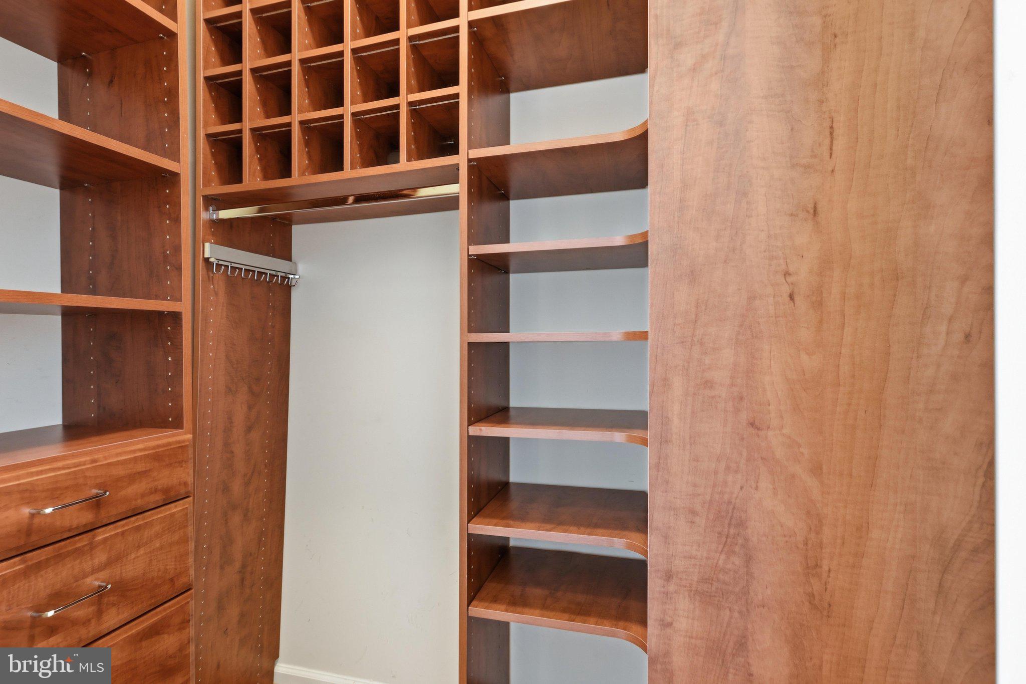 12001 Market Street, Unit 122 Reston, VA 20190 - Photo 24 of 53 Custom Built-in storage in closet