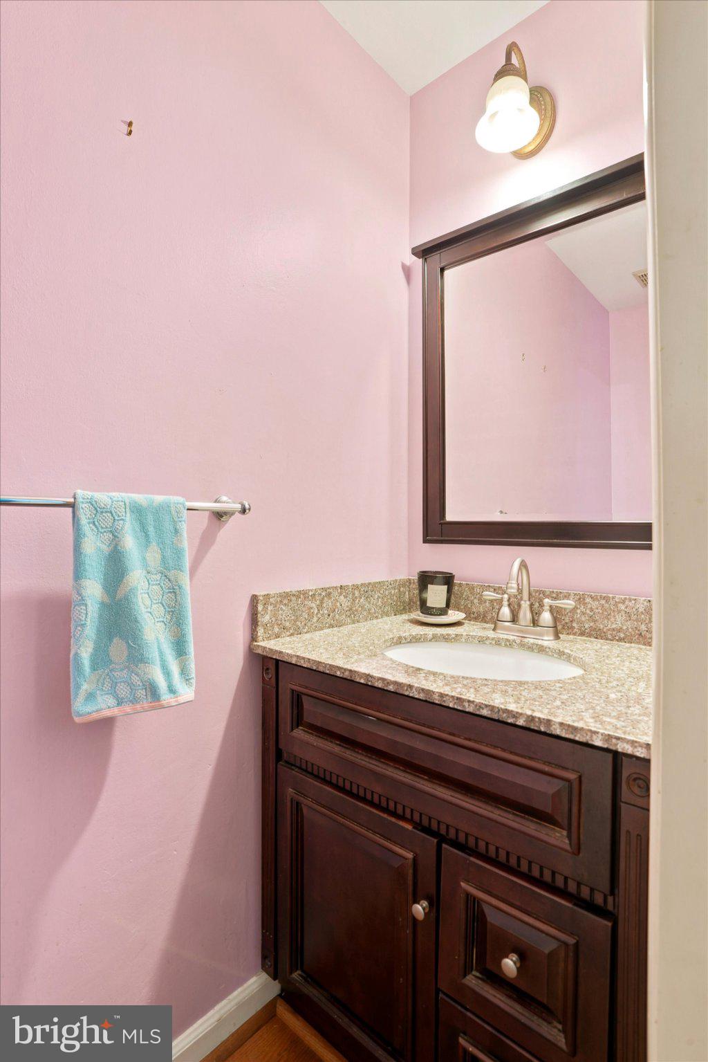 18 Medinah Drive Reading, PA 19607 - Photo 12 of 25 Charming pink-hued bathroom retreat.