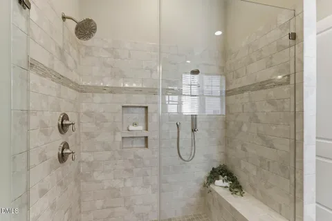 a kitchen with granite countertop white cabinets and a sink
