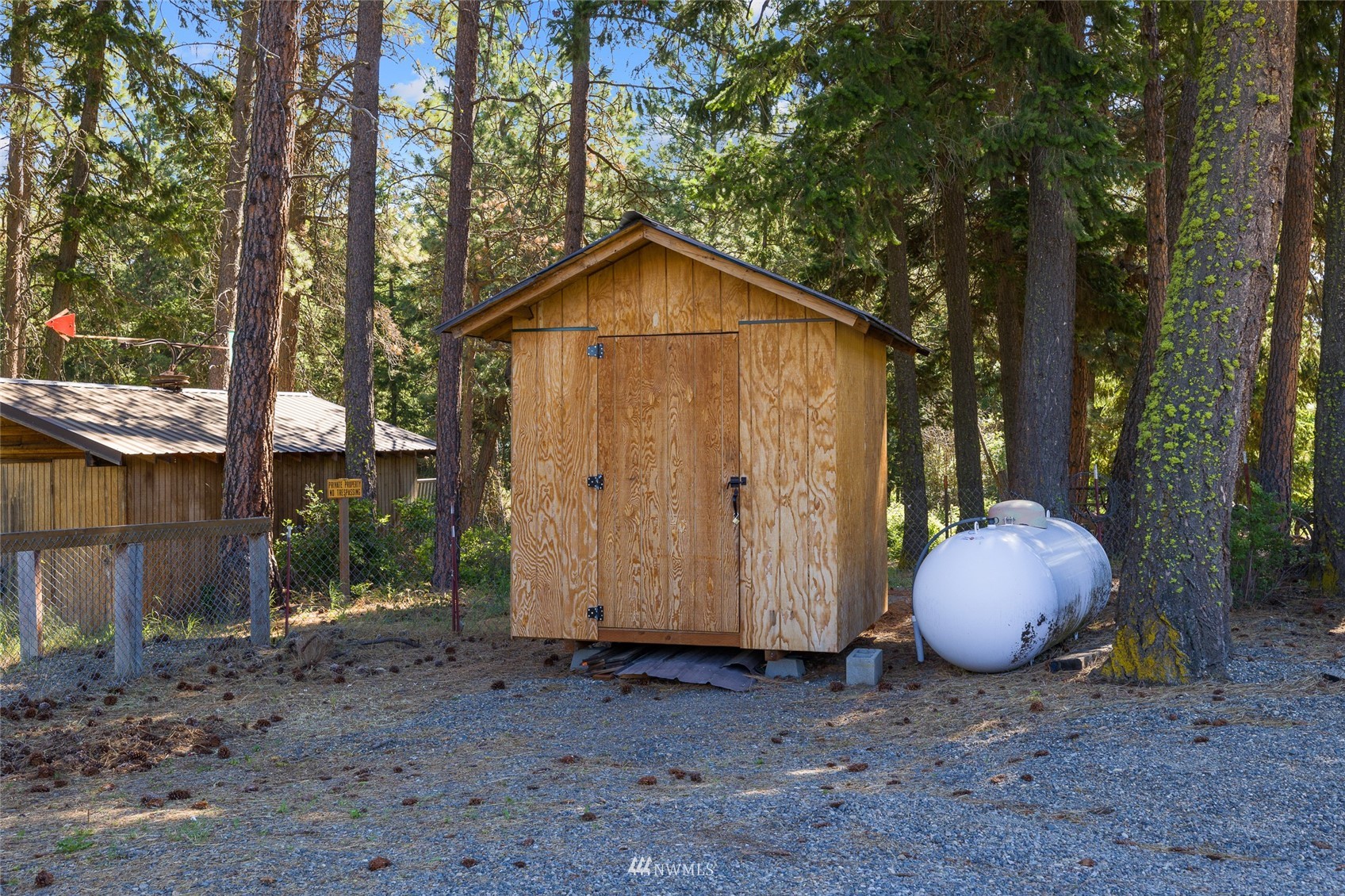 5741 Upper Peoh Point Road Cle Elum, WA 98922 - Photo 4 of 39 a backyard of a house with seating space