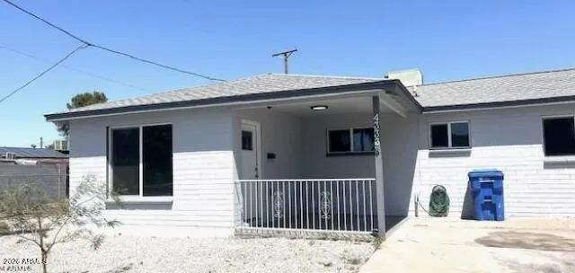 a view of a house with a roof deck