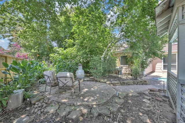a view of a tables and chairs in the patio
