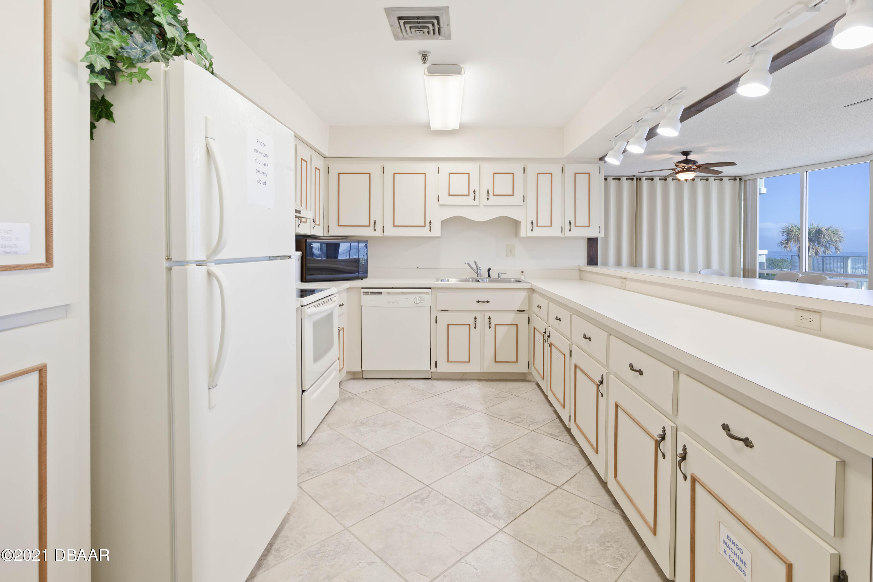 1051 Ocean Shore Boulevard, Unit 603 Ormond Beach, FL 32176 - Photo 26 of 30 Club Room Kitchen