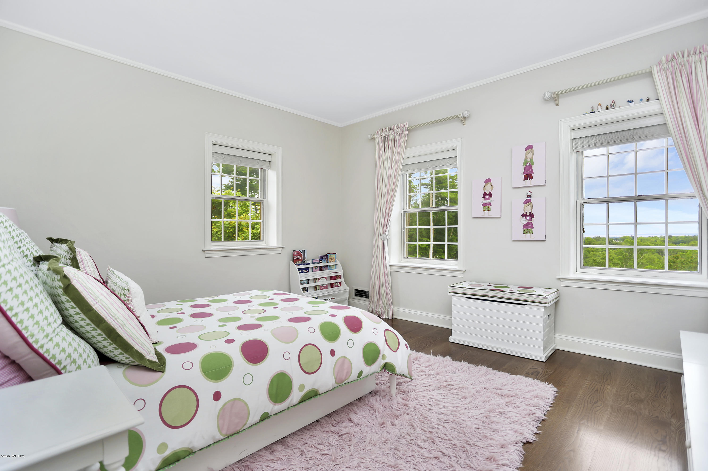5 Dairy Road Greenwich, CT 06830 - Photo 24 of 32 a bedroom with a bed and a window