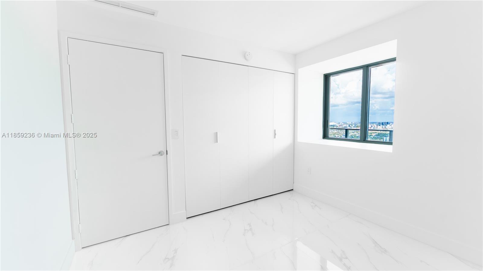 700 Northeast 24th Street, Unit 3605 Miami, FL 33137 - Photo 25 of 44 a view of a small space with a window