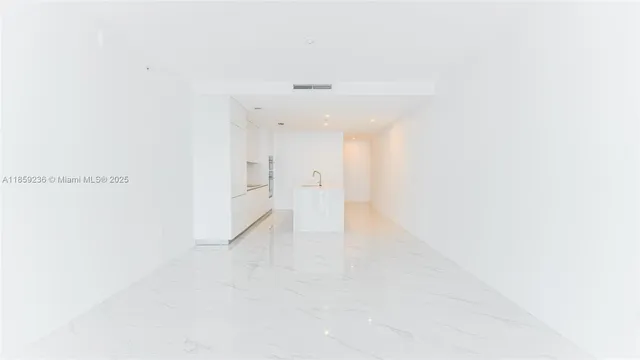 a view of a bathroom with a tub and mirror