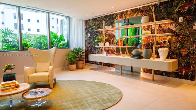 a hallway with a potted plant in front of it