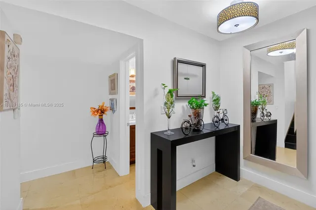 a view of living room and kitchen